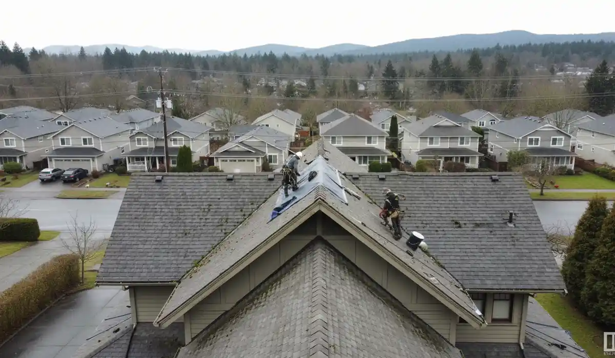Roofing crew working on a property in Puyallup, WA